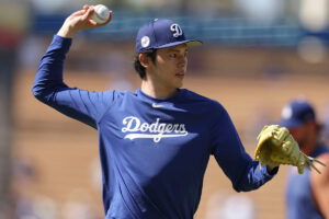 Roki Sasaki strikes out 2, hits 100 mph in return to Dodgers as a reliever