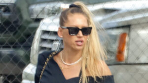 Rarely-seen tennis legend Anna Kournikova, 44, shows off growing baby bump months after health scare