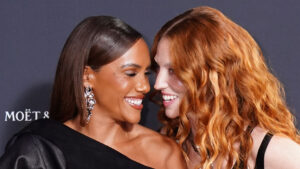 Alex Scott and Jess Glynne put on loved-up display at Elle Awards as BBC presenter stuns in elegant black dress