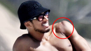 Topless Jude Bellingham shows off shoulder scar after surgery as Real Madrid star relaxes with girlfriend on boat