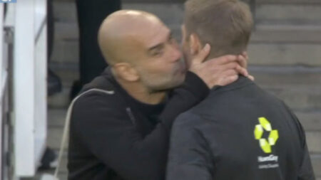 Pep Guardiola bizarrely KISSES fourth official during Arsenal vs Man City as fans baffled by moment of madness