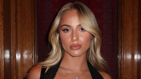 ‘World’s most beautiful footballer’ smoulders in plunging black dress as fans gasp ‘my jaw dropped’