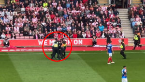 Southampton vs Portsmouth paused as pitch invader evades security before being dragged off by eight police and staff