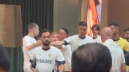 Cristiano Ronaldo forced to shove fan away as he tries to get selfie with Portugal and Man Utd legend at team hotel