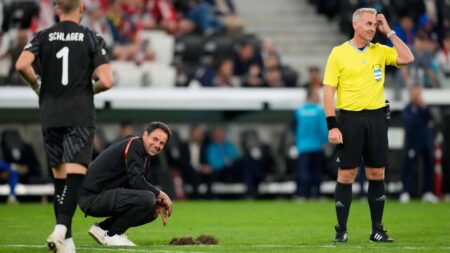 World Cup qualifier suspended as SINKHOLE opens up on pitch – before referee allows match to continue