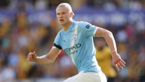 Why are Man City and Man Utd players wearing black armbands?