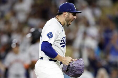 Dodgers edge Giants after bullpen manages to hold on to precarious lead