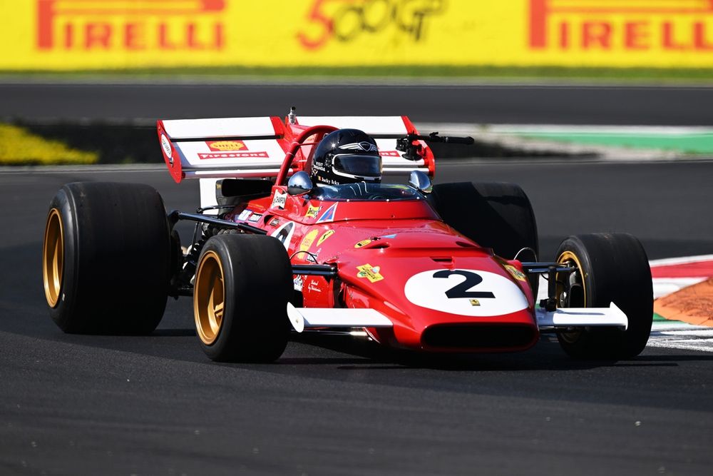 Jacky Ickx drives a Ferrari 312B on track