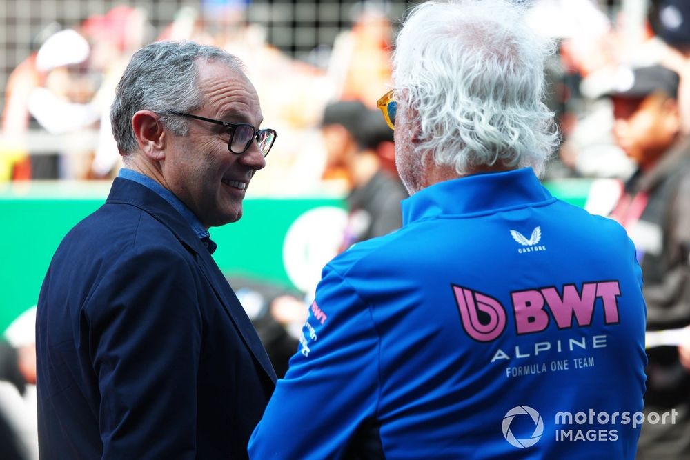 Stefano Domenicali, CEO of the Formula One Group talks with Flavio Briatore, Executive Advisor of Alpine F1