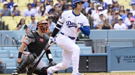 Ohtani hits 54th homer as Dodgers beat Diamondbacks 8-0 for 12th NL West title in 13 years
