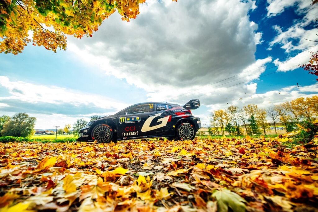 Ogier hangs onto lead after Rovanpera charge