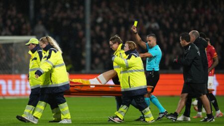 Watch bizarre moment Go Ahead Eagles star given yellow card… as he gets STRETCHERED OFF pitch vs Aston Villa