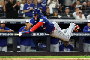 Vladimir Guerrero Jr. goes airborne on slide at home during Blue Jays’ 4-run third inning in Game 3 of ALDS