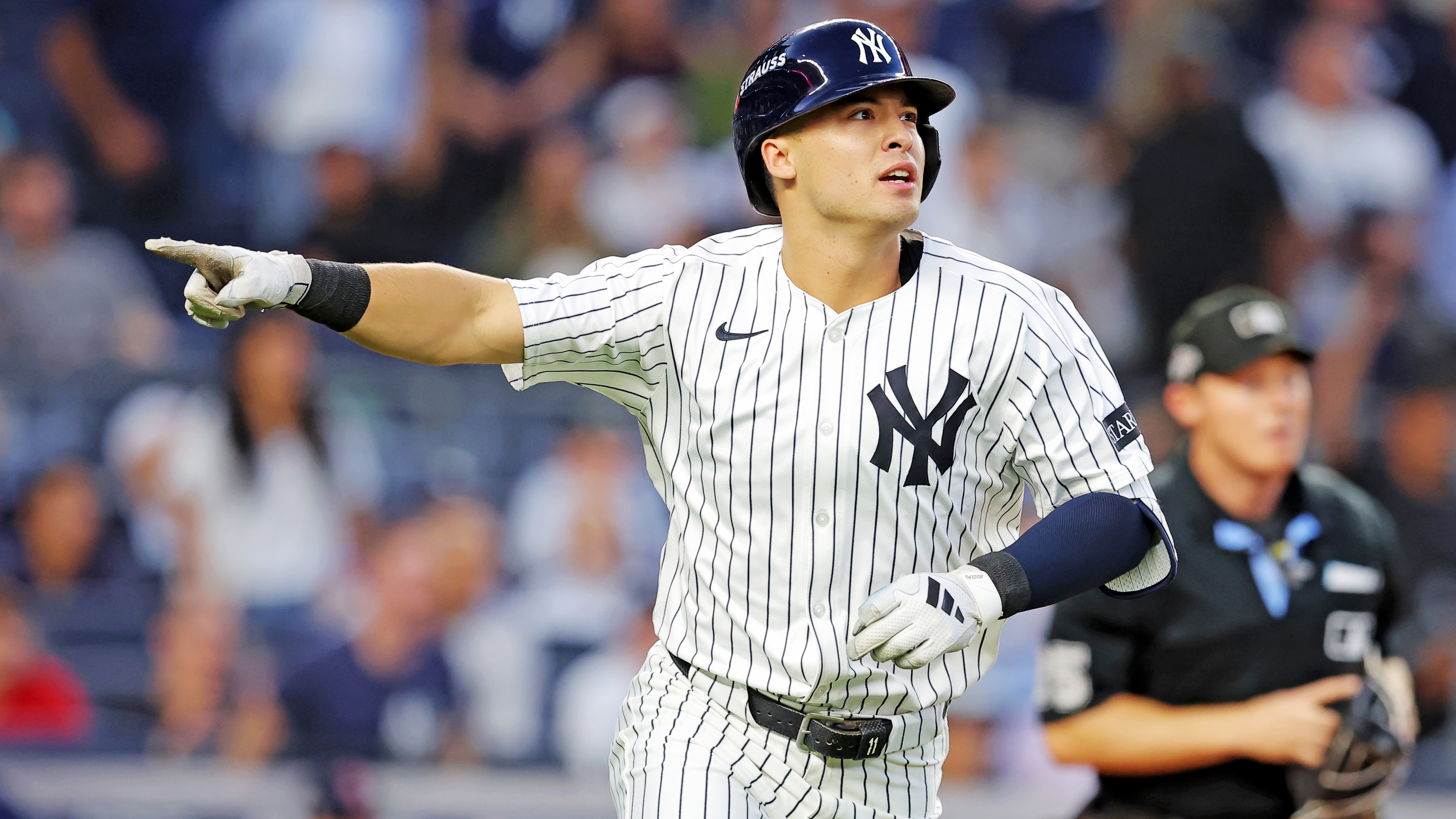  New York Yankees shortstop Anthony Volpe (11) hits a solo home run during the first inning against the Boston Red Sox during game one of the Wildcard round for the 2025 MLB playoffs at Yankee Stadium