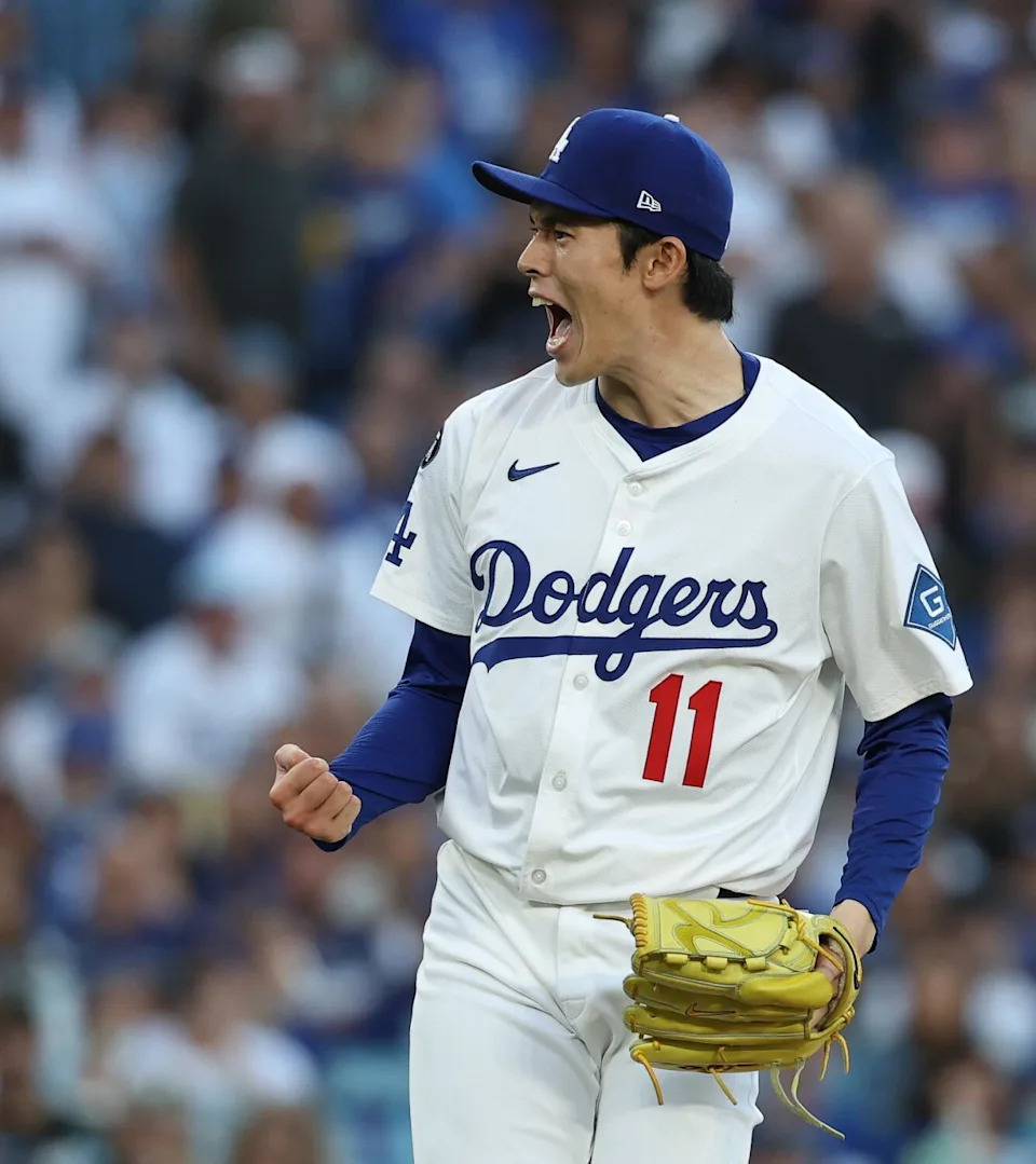 Dodgers pitcher Roki Sasaki exults after a strikeout in the ninth inning against the Phillies in Game 4 of the NLDS.