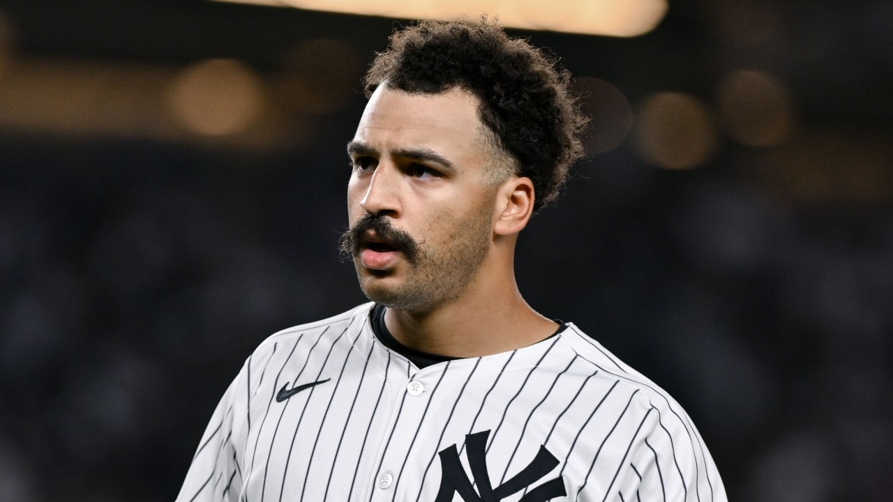 New York Yankees outfielder Trent Grisham (12) during a game against the Boston Red Sox at Yankee Stadium.