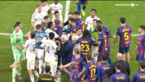 Huge brawl breaks out between Real Madrid and Barcelona after red card as benches get involved in ugly end to El Clasico