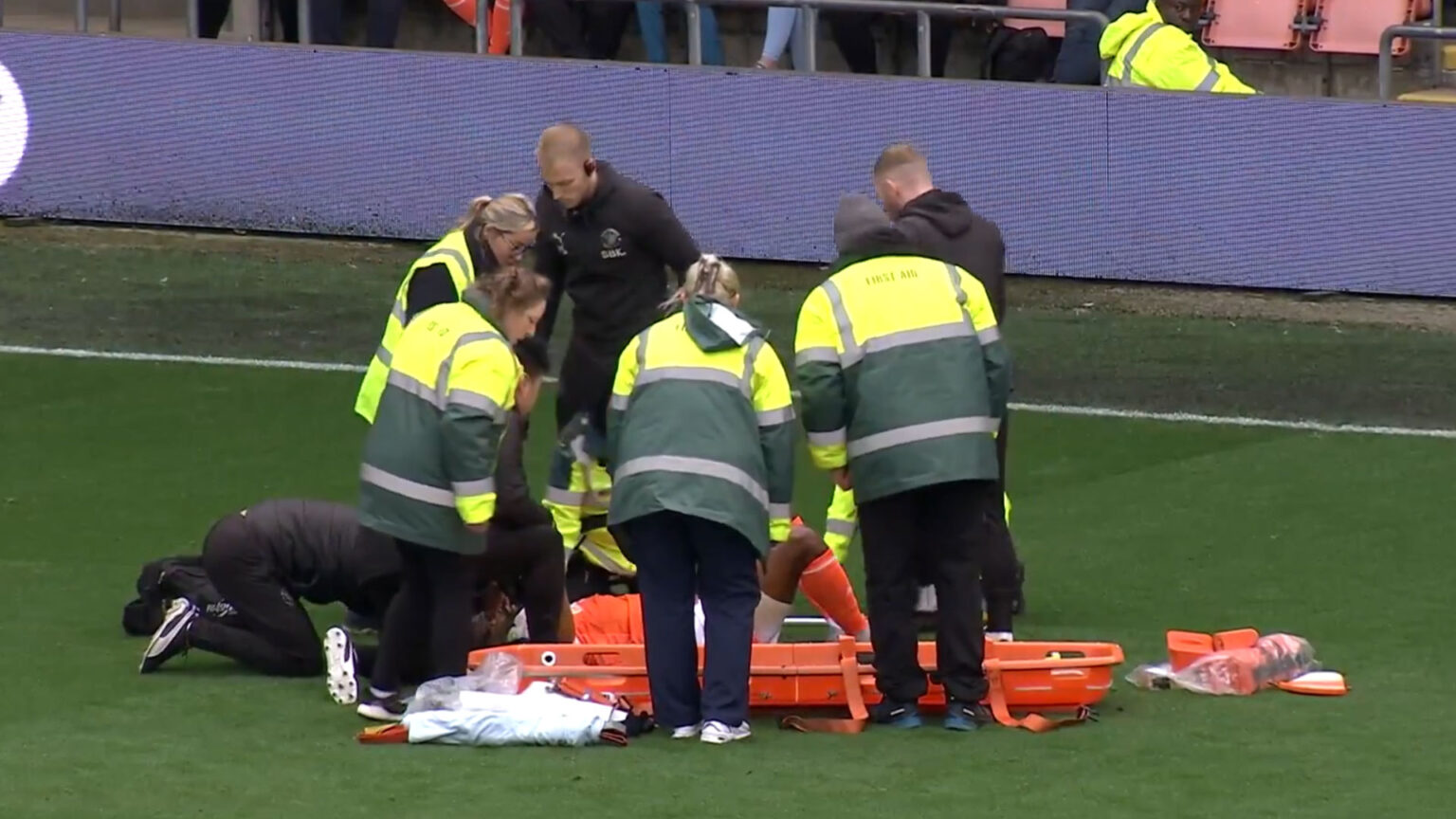 Blackpool star Michael Ihiekwe placed in neck brace and carried off on stretcher after very concerning injury