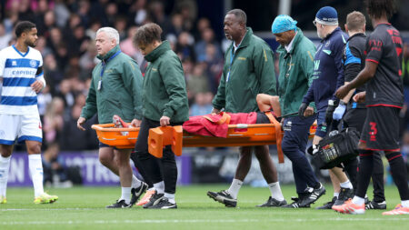 Millwall star Massimo Luongo carried off on stretcher against QPR as all four stands applaud stricken midfielder