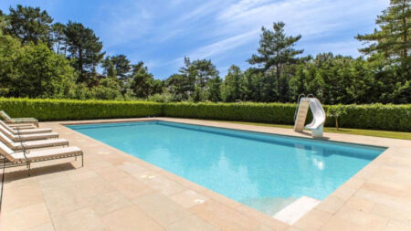 Former England star puts stunning Dorset mansion with sea views and heated pool on the market for £12MILLION
