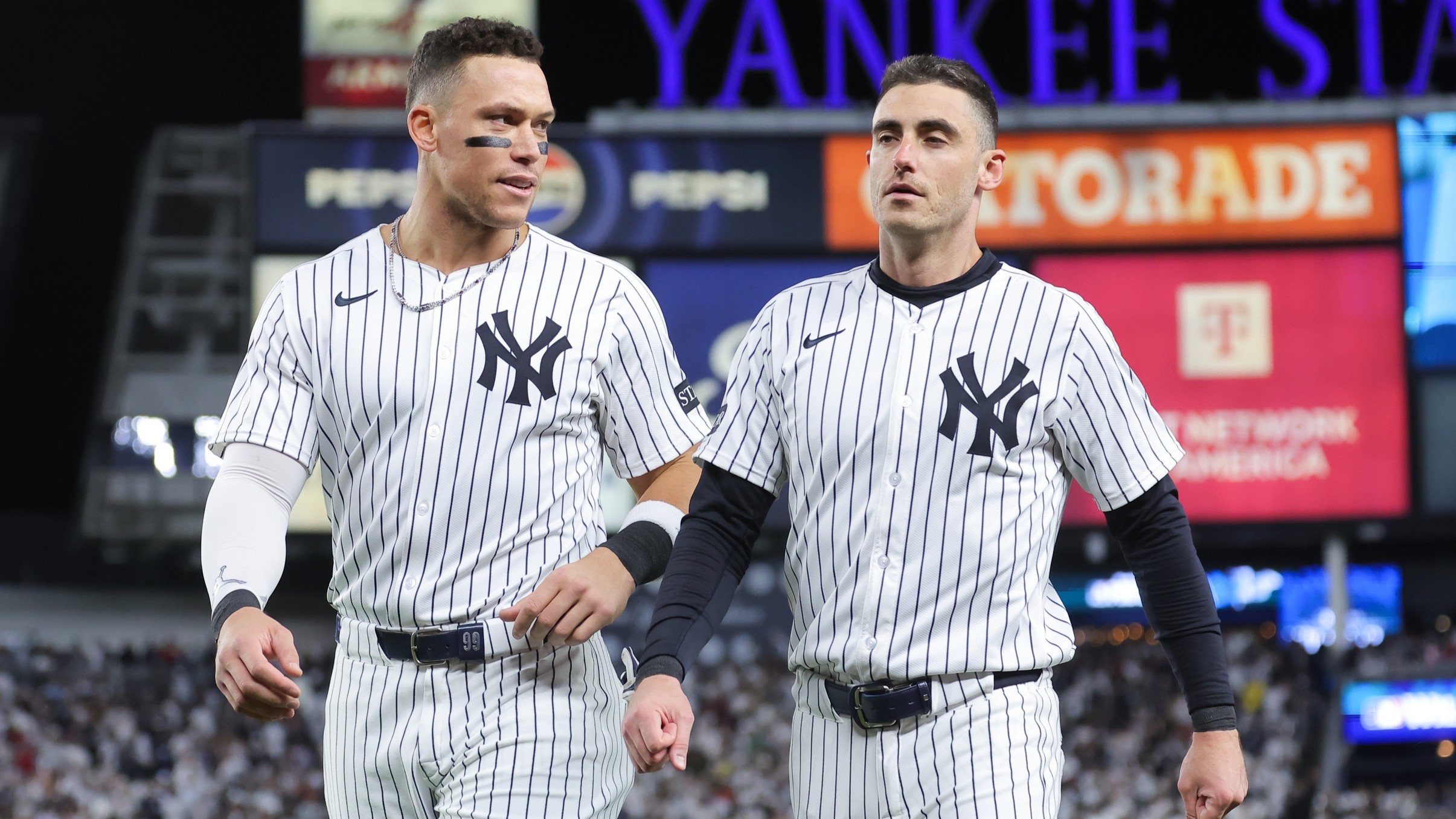 Oct 1, 2025; Bronx, New York, USA; New York Yankees right fielder Aaron Judge (99) speaks to New York Yankees left fielder Cody Bellinger (35) after the fifth inning against the Boston Red Sox during game two of the Wildcard round for the 2025 MLB playoffs at Yankee Stadium.