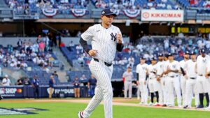 Aaron Boone defends his moves after Yankees bullpen falters again in playoff-opening loss to the Red Sox