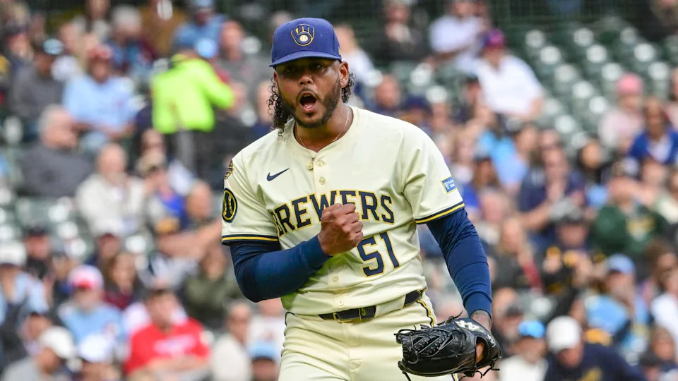 Sep 4, 2025; Milwaukee, Wisconsin, USA; Milwaukee Brewers starting pitcher Freddy Peralta (51) reacts after striking out Philadelphia Phillies third baseman Alec Bohm (not pictured) with the bases loaded in the fourth inning at American Family Field.