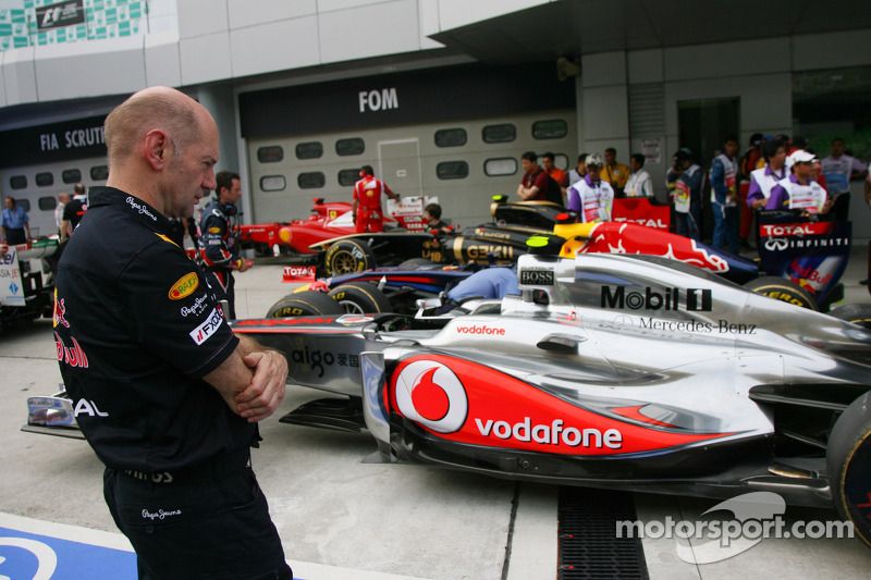 Adrian Newey, Red Bull Racing, Technical Operations Director looking at the McLaren