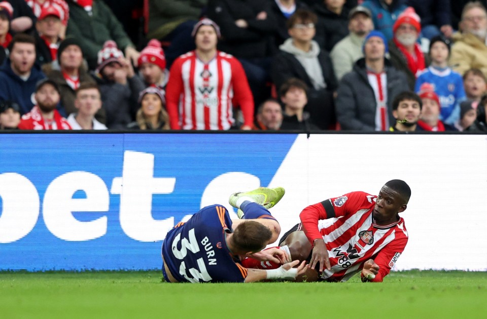 Sunderland's Nordi Mukiele fouls Newcastle United's Dan Burn.