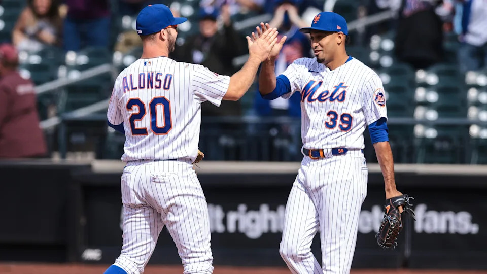 New York Mets first baseman Pete Alonso (20) and relief pitcher Edwin Diaz (39) slap hands after their game against the Washington Nationals during the top of the ninth inning at Citi Field