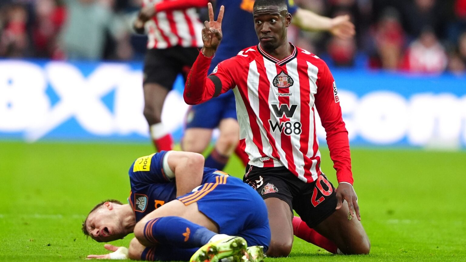 Newcastle star Dan Burn ‘rushed to hospital with breathing difficulties’ after going off with rib injury at Sunderland