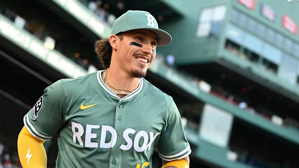 Boston, Massachusetts, USA; Boston Red Sox left fielder Jarren Duran (16) runs out of the dugout before the start of a game against the Atlanta Braves at Fenway Park.