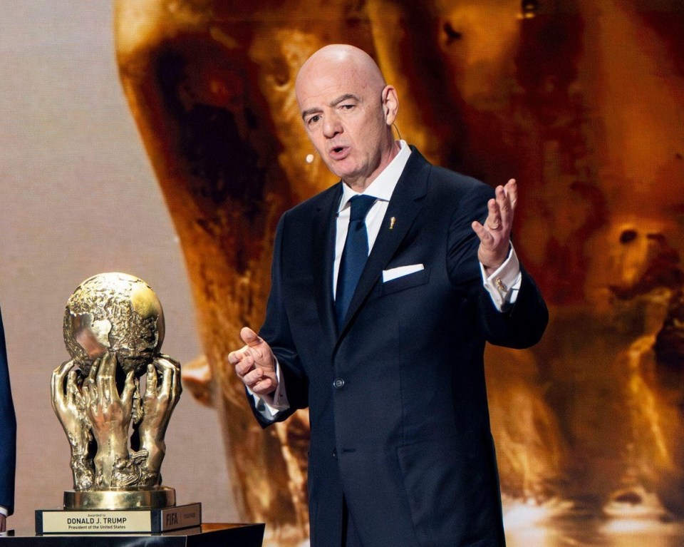 President Trump receives the FIFA Peace Prize from FIFA President Gianni Infantino at the 2026 World Cup Draw.