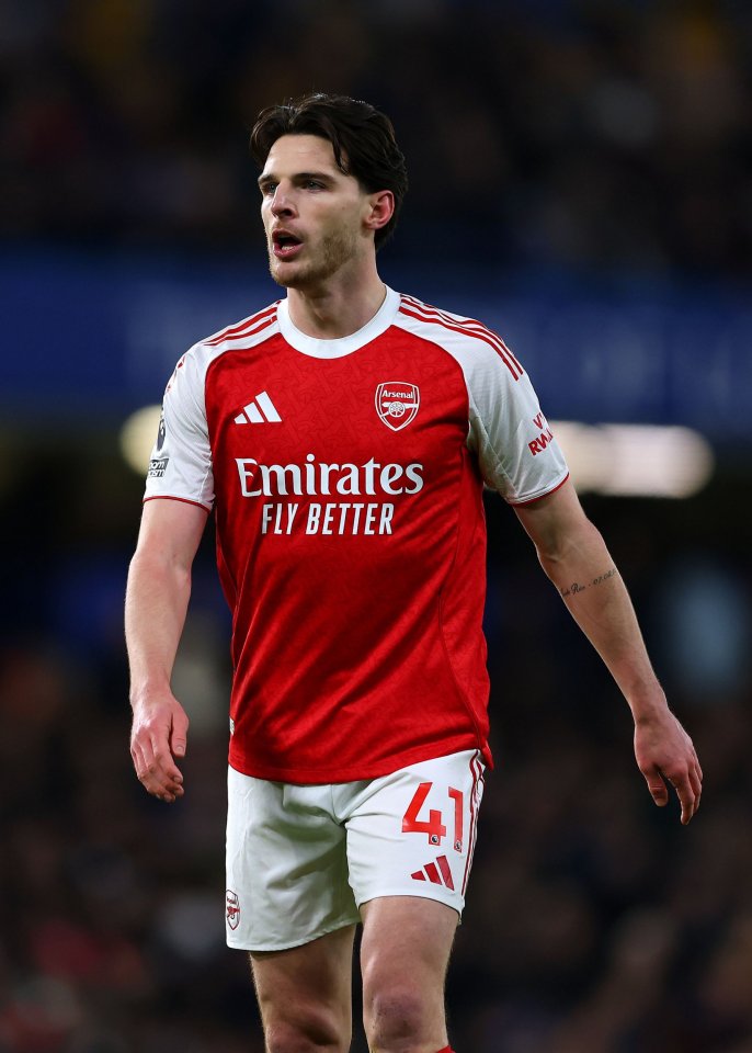 Arsenal player Declan Rice wearing his red and white kit with number 41 during a match against Chelsea.