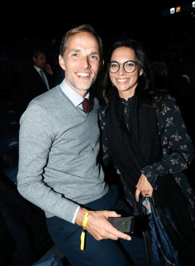 Photo of a man and woman smiling for the camera.