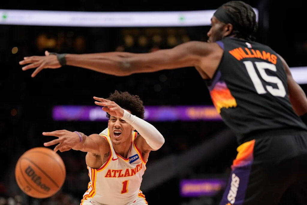 Hawks rally to beat Suns 110-103 after Phoenix loses Devin Booker to injury