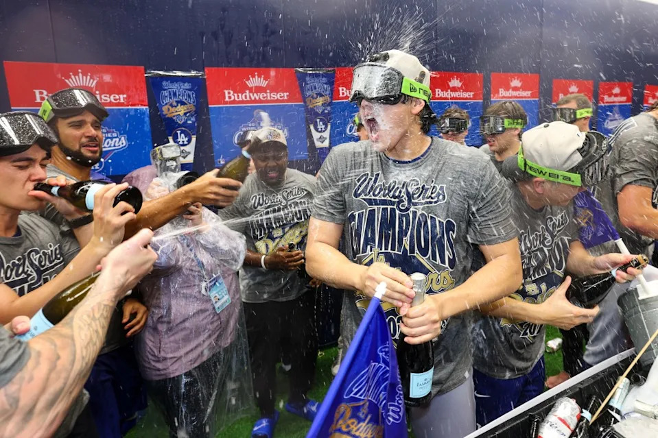 Dodgers’ Ohtani celebrates with teammates in the locker room after defeating the Blue Jays. Getty Images