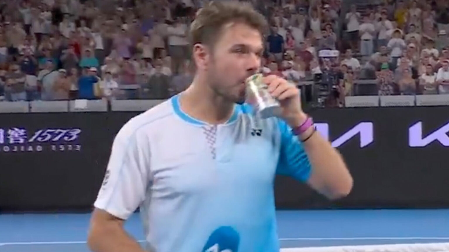 Three-time Grand Slam champion, 40, sinks can of beer on court after heroic battle in last ever Australian Open match