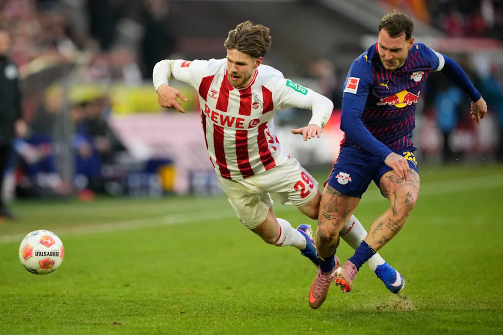 Leipzig holds on to beat Cologne 2-1 to boost Champions League qualification hopes