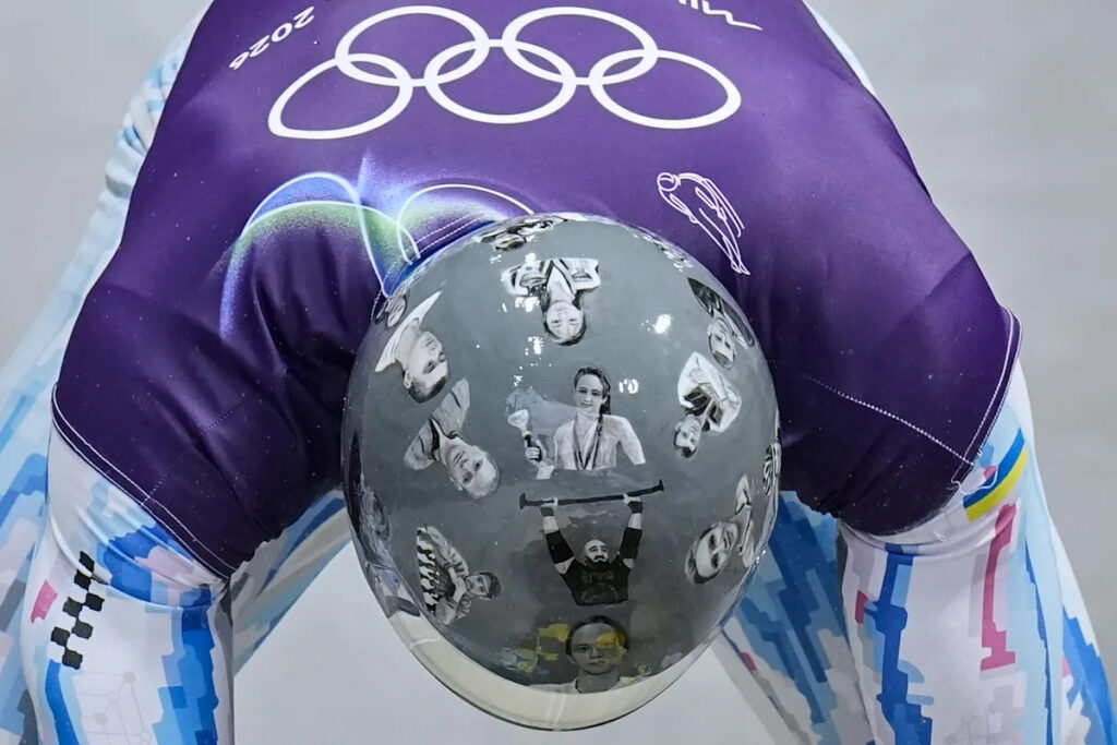 In photos: Ukraine’s Vladyslav Heraskevych out of Winter Olympics over banned helmet tribute