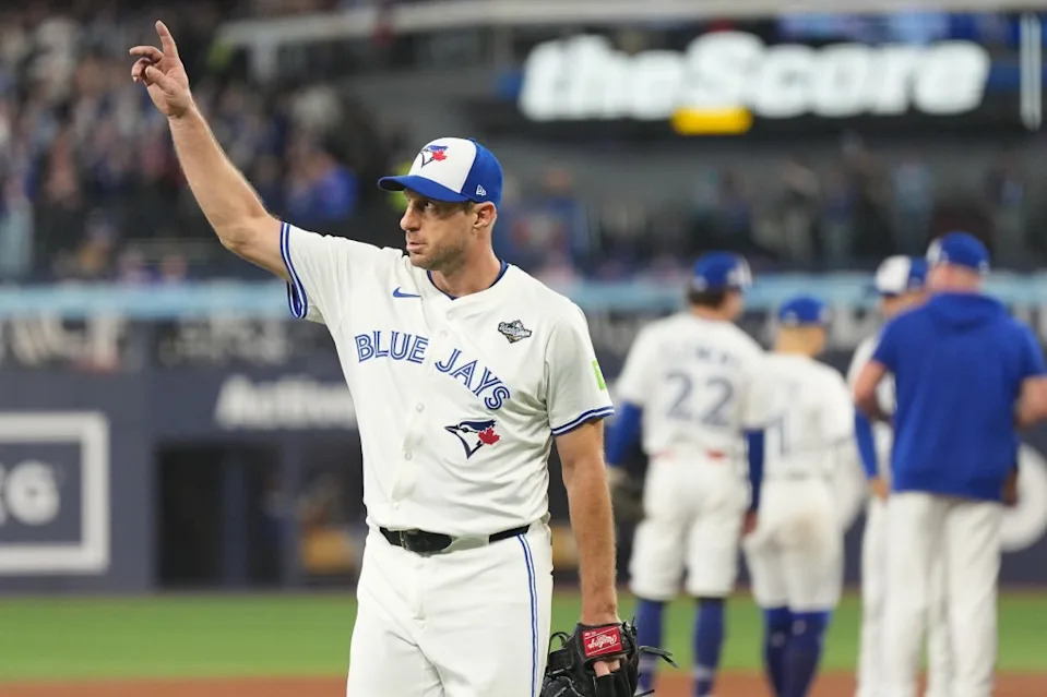 Blue Jays starter Max Scherzer walks to the dugout after being relieved during a World Series game against the Dodgers at Rogers Centre. Sports Illustrated via Getty Ima