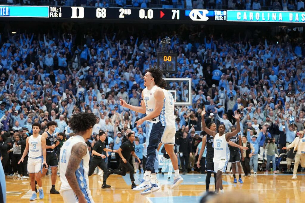 How much was UNC basketball fined by ACC for court storming vs Duke? Conference rules
