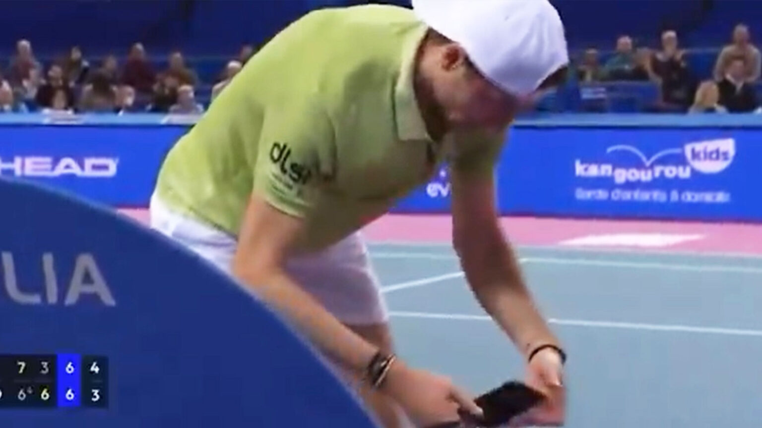 Shock moment world No38 halts match at crucial moment to CHECK PHONE before losing every single point en route to loss