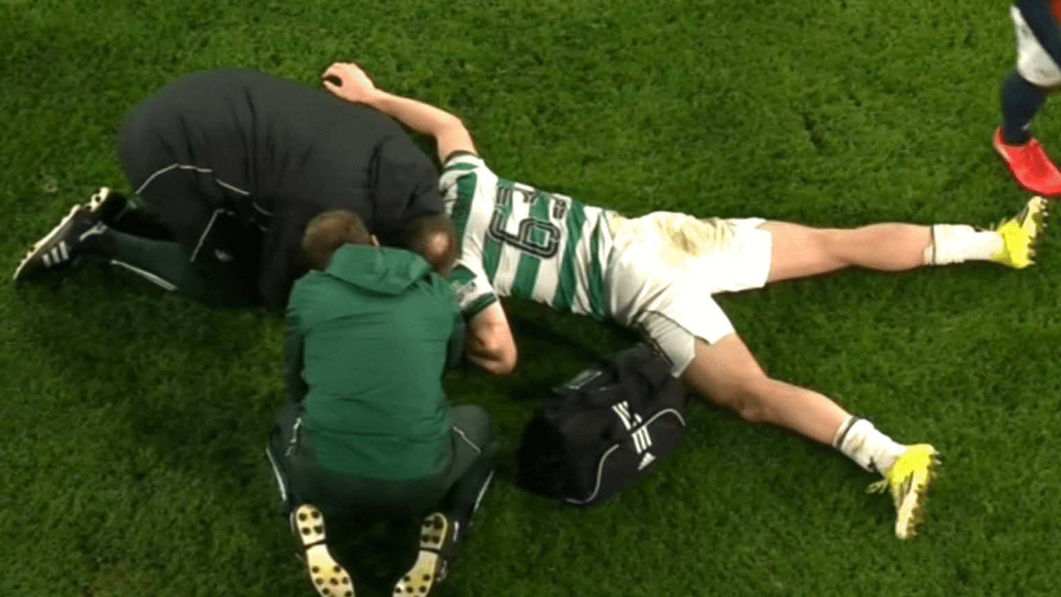 Celtic star Kieran Tierney left lying flat out after being caught with flying boot to the face against Dundee