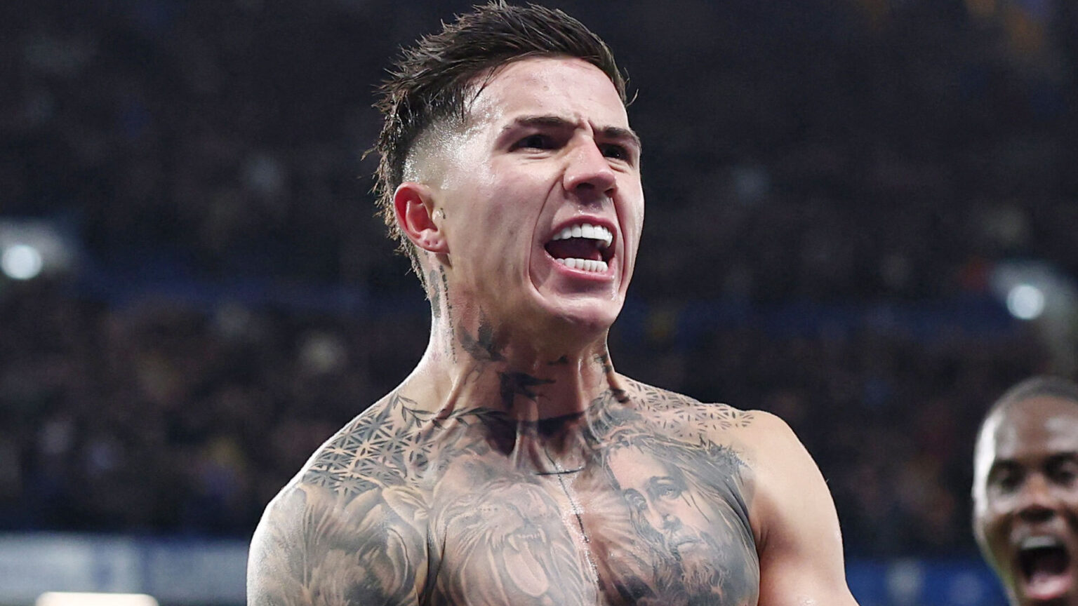 Enzo Fernandez nearly suffers horror wardrobe malfunction as he strips while wildly celebrating Chelsea win vs West Ham