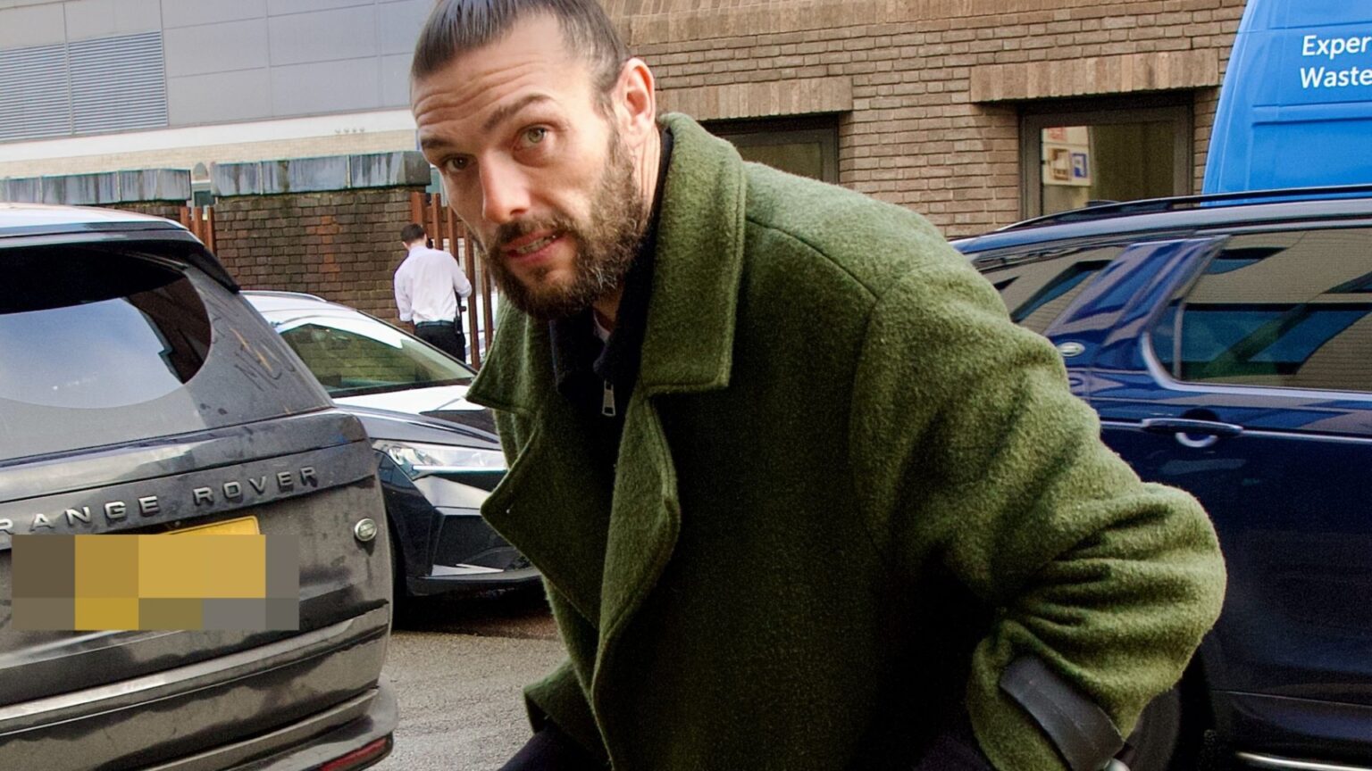 Ex-England star Andy Carroll arrives at court on crutches accused of breaching non-molestation order