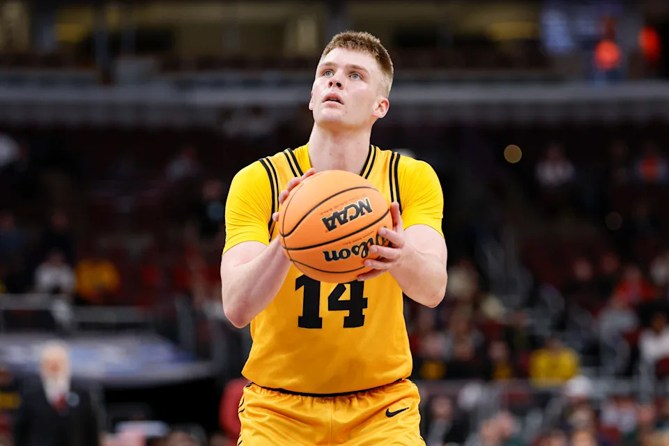 Iowa Hawkeyes guard Bennett Stirtz (14) shoots a free throw against the Maryland Terrapins during the second half at United Center.