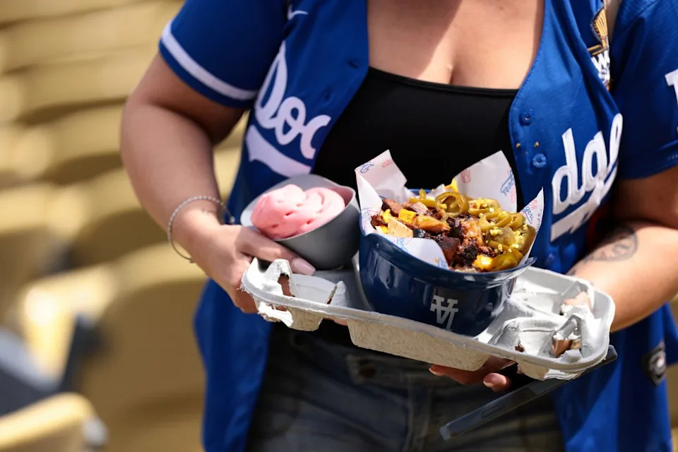 And then, somewhere between the parking gate and the first bite of a hot dog, reality taps you on the shoulder. MLB Photos via Getty Images
