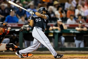 White Sox win one, 4-2, and wear one, 13-6