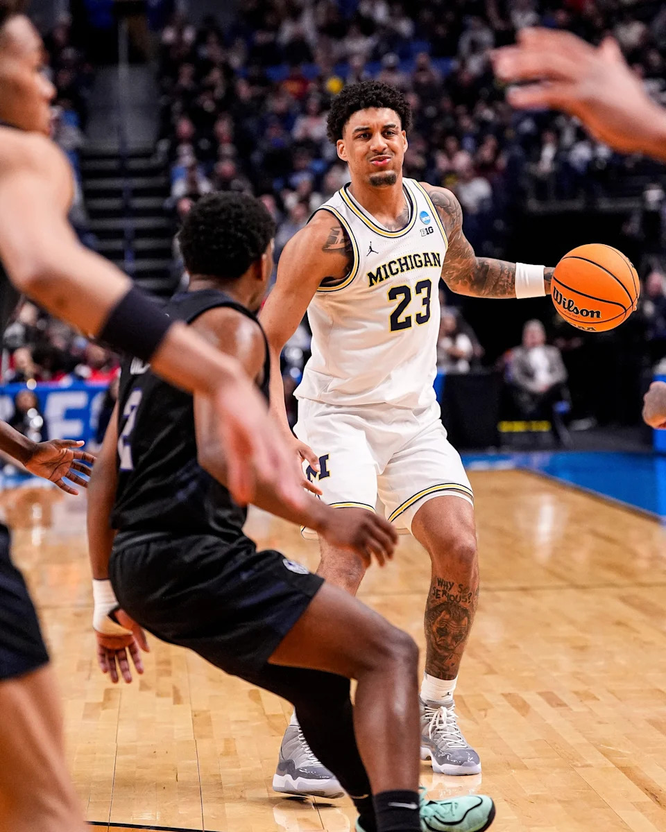 Michigan's Yaxel Lendeborg looks to pass the ball during the first-round NCAA Tournament game against Howard at KeyBank Center in Buffalo on March 19, 2026.